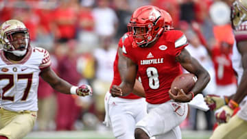 Sep 17, 2016; Louisville, KY, USA; Louisville Cardinals quarterback Lamar Jackson (8) runs the ball against the Florida State Seminoles during the second half at Papa John