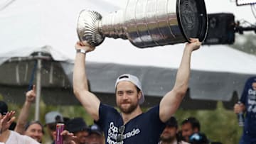 Jul 12, 2021; Tampa, FL, USA; Tampa Bay Lightning defenseman Victor Hedman (77) hoists the Stanley Cup during the Stanley Cup Championship parade. Mandatory Credit: Kim Klement-USA TODAY Sports