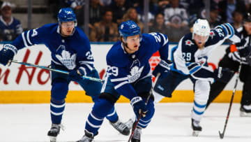 TORONTO, ON - MARCH 31: William Nylander #29 of the Toronto Maple Leafs, Auston Matthews #34 of the Toronto Maple Leafs and Patrik Laine #29 of the Winnipeg Jets compete during the first period at the Air Canada Centre on March 31, 2018 in Toronto, Ontario, Canada. (Photo by Mark Blinch/NHLI via Getty Images)