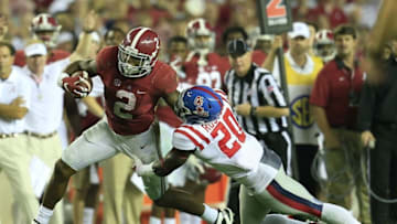 Sep 19, 2015; Tuscaloosa, AL, USA; Alabama Crimson Tide running back Derrick Henry (2) pushes away Mississippi Rebels linebacker Christian Russell (20) at Bryant-Denny Stadium. The Rebels defeated the Tide 43-37. Mandatory Credit: Marvin Gentry-USA TODAY Sports