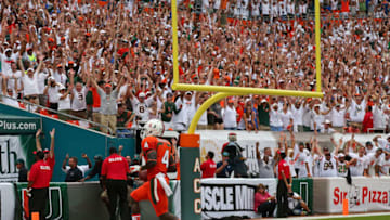 MIAMI GARDENS, FL - SEPTEMBER 07: Phillip Dorsett #4 of the Miami Hurricanes scores a touchdown during a game against the Florida Gators at Sun Life Stadium on September 7, 2013 in Miami Gardens, Florida. (Photo by Mike Ehrmann/Getty Images)