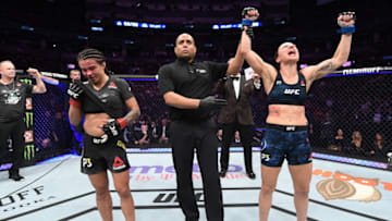 TORONTO, CANADA - DECEMBER 08: (R-L) Nina Ansaroff celebrates her victory over Claudia Gadelha of Brazil in their strawweight fight during the UFC 231 event at Scotiabank Arena on December 8, 2018 in Toronto, Canada. (Photo by Josh Hedges/Zuffa LLC/Zuffa LLC via Getty Images)