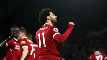 LIVERPOOL, ENGLAND - MARCH 17: Mohamed Salah of Liverpool celebrates scoring his side's second goal during the Premier League match between Liverpool and Watford at Anfield on March 17, 2018 in Liverpool, England. (Photo by Jan Kruger/Getty Images)