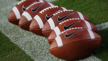COLLEGE STATION, TX - OCTOBER 11: Footballs sit on the field prior to the start of their game between the Mississippi Rebels and the Texas A&M Aggies at Kyle Field on October 11, 2014 in College Station, Texas. (Photo by Scott Halleran/Getty Images)