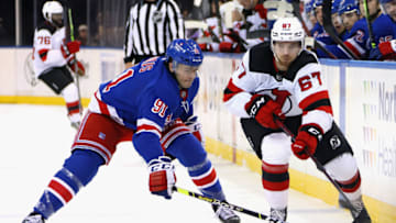 NEW YORK, NEW YORK - OCTOBER 06: Sammy Blais #91 of the New York Rangers skates against Marian Studenic #67 of the New Jersey Devils during a preseason game at Madison Square Garden on October 06, 2021 in New York City. The Rangers defeated the Devils 6-2. (Photo by Bruce Bennett/Getty Images)