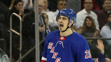 NEW YORK, NEW YORK - DECEMBER 16: Chris Kreider #20 of the New York Rangers yells at Mattias Ekholm #14 of the Nashville Predators after a second period penalty on Ekholm at Madison Square Garden on December 16, 2019 in New York City. (Photo by Bruce Bennett/Getty Images)