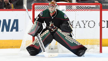 GLENDALE, ARIZONA - OCTOBER 05: Goalie Darcy Kuemper #35 of the Arizona Coyotes gets ready to make a save against the Boston Bruins at Gila River Arena on October 05, 2019 in Glendale, Arizona. (Photo by Norm Hall/NHLI via Getty Images)