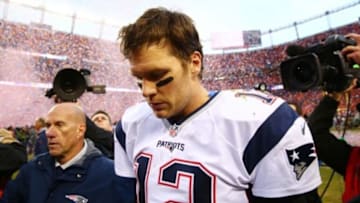 Jan 24, 2016; Denver, CO, USA; New England Patriots quarterback Tom Brady (12) walks off the field after the AFC Championship football game against the Denver Broncos at Sports Authority Field at Mile High. Mandatory Credit: Mark J. Rebilas-USA TODAY Sports
