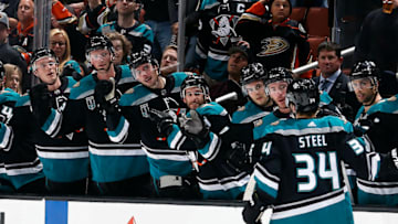 ANAHEIM, CA - OCTOBER 21: Sam Steel #34 of the Anaheim Ducks celebrates his first NHL goal with his teammates during the game against the Buffalo Sabres on October 21, 2018 at Honda Center in Anaheim, California. (Photo by Debora Robinson/NHLI via Getty Images)