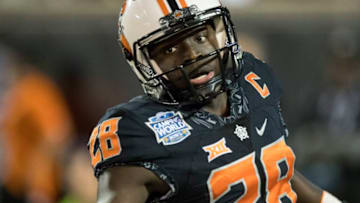 ORLANDO, FL - DECEMBER 28: DUPLICATE***Oklahoma State Cowboys wide receiver James Washington (28) catches a 65 yard touch down pass During the Camping World Bowl between Oklahoma State and Virginia Tech at Camping World Stadium on December 28th(Photo by Andrew Bershaw/Icon Sportswire via Getty Images)