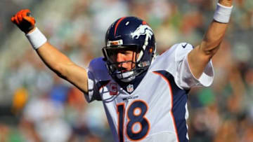 Oct 12, 2014; East Rutherford, NJ, USA; Denver Broncos quarterback Peyton Manning (18) reacts against the New York Jets during the third quarter of their NFL football game at MetLife Stadium. The Broncos defeated the Jets 31-17. Mandatory Credit: Adam Hunger-USA TODAY Sports