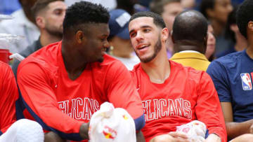 NEW ORLEANS, LOUISIANA - OCTOBER 11: Zion Williamson #1 of the New Orleans Pelicans and Lonzo Ball #2 talk during the second half of a game against the Utah Jazz at the Smoothie King Center on October 11, 2019 in New Orleans, Louisiana. (Photo by Jonathan Bachman/Getty Images)