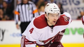 Nov 14, 2014; Vancouver, British Columbia, CAN; Arizona Coyotes defenseman Zbynek Michalek (4) awaits the face off against the Vancouver Canucks during the first period at Rogers Arena. The Arizona Coyotes won 5-0. Mandatory Credit: Anne-Marie Sorvin-USA TODAY Sports
