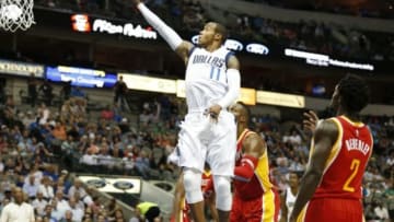 Oct 7, 2014; Dallas, TX, USA; Dallas Mavericks guard Monta Ellis (11) shoots against the Houston Rockets at American Airlines Center. Mandatory Credit: Matthew Emmons-USA TODAY Sports