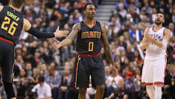 Mar 10, 2016; Toronto, Ontario, CAN; Atlanta Hawks point guard Jeff Teague (0) is congratulated by guard Kyle Korver (26) after scoring a basket against the Toronto Raptors at Air Canada Centre. Mandatory Credit: Tom Szczerbowski-USA TODAY Sports