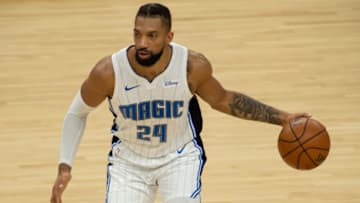 Feb 14, 2021; Phoenix, Arizona, USA; Orlando Magic center Khem Birch (24) handles the ball against the Phoenix Suns during the second half at Phoenix Suns Arena. Mandatory Credit: Jennifer Stewart-USA TODAY Sports