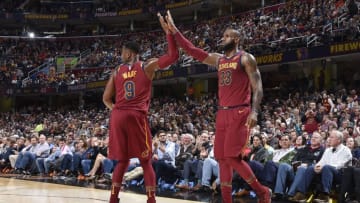 CLEVELAND, OH - OCTOBER 24: Dwyane Wade #9 of the Cleveland Cavaliers and LeBron James #23 of the Cleveland Cavaliers high five during the game against the Chicago Bulls on October 24, 2017 at Quicken Loans Arena in Cleveland, Ohio. NOTE TO USER: User expressly acknowledges and agrees that, by downloading and or using this Photograph, user is consenting to the terms and conditions of the Getty Images License Agreement. Mandatory Copyright Notice: Copyright 2017 NBAE (Photo by David Liam Kyle/NBAE via Getty Images)