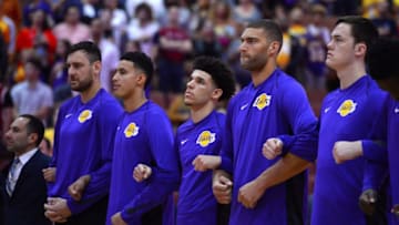 ANAHEIM, CA - SEPTEMBER 30: (left to right) Andrew Bogut, Kyle Kuzma, Lonzo Ball, Brook Lopez and Stephen Zimmerman of Los Angeles Lakers lock arms during the national anthem before the start of the game against the Minnesota Timberwolves on September 30, 2017 at the Honda Center in Anaheim, California. NOTE TO USER: User expressly acknowledges and agrees that, by downloading and or using this photograph, User is consenting to the terms and conditions of the Getty Images License Agreement. (Photo by Robert Laberge/Getty Images)