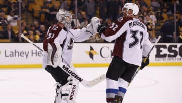 Dec 8, 2016; Boston, MA, USA; Colorado Avalanche goalie Calvin Pickard (31) celebrates with defenseman Francois Beauchemin (32) after defeating the Boston Bruins 4-2 at TD Garden. Mandatory Credit: Greg M. Cooper-USA TODAY Sports