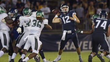 UConn Huskies quarterback Mike Beaudry (12) drops back to pass against Wagner on Thursday, Aug. 29, 2019 at Rentschler Field in East Hartford, Conn. (Brad Horrigan/Hartford Courant/Tribune News Service via Getty Images)