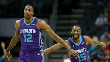 CHARLOTTE, NC - FEBRUARY 11: Teammates Dwight Howard