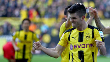 DORTMUND, GERMANY - MARCH 04: Christian Pulisic of Dortmund celebrates after scoring his teams fourth goal during the Bundesliga match between Borussia Dortmund and Bayer 04 Leverkusen at Signal Iduna Park on March 4, 2017 in Dortmund, Germany. (Photo by Lars Baron/Bongarts/Getty Images)