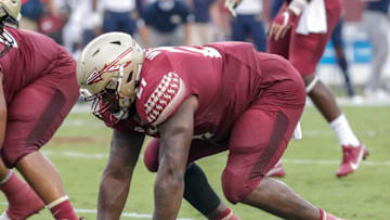 TALLAHASSEE, FL - SEPTEMBER 12: Defensive End Marvin Wilson #21 of the Florida State Seminoles during the game against the Georgia Tech Yellow Jackets at Doak Campbell Stadium on Bobby Bowden Field on September 12, 2020 in Tallahassee, Florida. The Yellow Jackets defeated the Seminoles 16 to 13. (Photo by Don Juan Moore/Getty Images)
