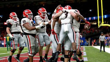 NEW ORLEANS, LOUISIANA - JANUARY 01: Zamir White #3 of the Georgia Bulldogs celebrates with teammates after scoring a touchdown against the Baylor Bears during the Allstate Sugar Bowl at Mercedes Benz Superdome on January 01, 2020 in New Orleans, Louisiana. (Photo by Sean Gardner/Getty Images)