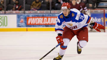 TORONTO, ON - DECEMBER 27: Assistant Captain Defenseman Yegor Rykov #28 of Team Russia speeds through the neutral zone against Team Latvia in a preliminary game during the IIHF World Junior Championship on December 27, 2016 at the Air Canada Centre in Toronto, Canada. (Photo by Adam Pulicicchio/Getty Images) *** Local Captions *** Yegor Rykov