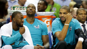 CHARLOTTE, NC - OCTOBER 11: (L-R) Teammates Kemba Walker
