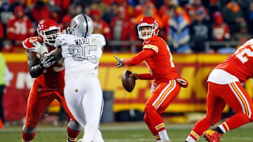 Dec 8, 2016; Kansas City, MO, USA; Kansas City Chiefs quarterback Alex Smith (11) throws a pass during the game against the Oakland Raiders at Arrowhead Stadium. The Chiefs won 21-13. Mandatory Credit: Jay Biggerstaff-USA TODAY Sports