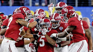 Dec 31, 2015; Arlington, TX, USA; Alabama Crimson Tide defensive back Cyrus Jones (5) celebrates with teammates during the game against the Michigan State Spartans in the 2015 CFP semifinal at the Cotton Bowl at AT&T Stadium. Mandatory Credit: Kevin Jairaj-USA TODAY Sports