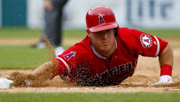 Aug 28, 2016; Detroit, MI, USA; Los Angeles Angels center fielder Mike Trout (27) dives back safe to first in the sixth inning against the Detroit Tigers at Comerica Park. Mandatory Credit: Rick Osentoski-USA TODAY Sports