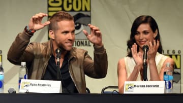 Actor Ryan Reynolds and Morena Baccarin from "Deadpool" speak onstage at the 20th Century FOX panel during Comic-Con International 2015 at the San Diego Convention Center