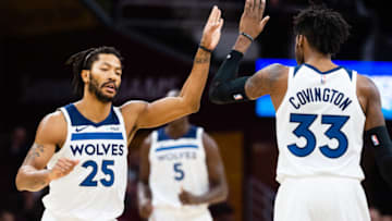 CLEVELAND, OH - NOVEMBER 26: Derrick Rose #25 celebrates with Robert Covington #33 of the Minnesota Timberwolves. (Photo by Jason Miller/Getty Images)