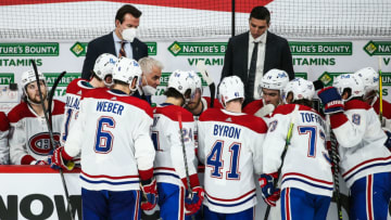 Jun 4, 2021; Winnipeg, Manitoba, CAN; Montreal Canadiens coach Dominique Ducharme discuss strategy against the Winnipeg Jets during the third period in game two of the second round of the 2021 Stanley Cup Playoffs at Bell MTS Place. Mandatory Credit: Terrence Lee-USA TODAY Sports
