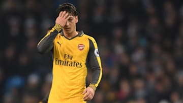 MANCHESTER, ENGLAND - DECEMBER 18: Mesut Ozil of Arsenal is dejected after the final whistle during the Premier League match between Manchester City and Arsenal at the Etihad Stadium on December 18, 2016 in Manchester, England. (Photo by Michael Regan/Getty Images)