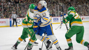 Jan 28, 2023; Saint Paul, Minnesota, USA; Buffalo Sabres left wing Jeff Skinner (53) draws a penalty on Minnesota Wild center Connor Dewar (26), defenseman Matt Dumba (24) in on the play in the first period at Xcel Energy Center. Mandatory Credit: Matt Blewett-USA TODAY Sports