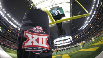 ARLINGTON, TX - DECEMBER 07, 2019 - Detail view of Big 12 logo as the Baylor Bears band plays on the field before Baylor plays the Oklahoma Sooners in the Big 12 Football Championship at AT&T Stadium on December 7, 2019 in Arlington, Texas. (Photo by Ron Jenkins/Getty Images)