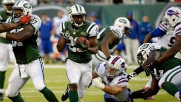 Sep 22, 2013; East Rutherford, NJ, USA; New York Jets running back Bilal Powell (29) with the ball against the Buffalo Bills at MetLife Stadium. Mandatory Credit: Robert Deutsch-USA TODAY Sports