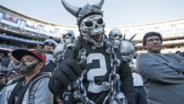 SAN DIEGO, CA - DECEMBER 18: An Oakland Raiders fan reacts en route to the Raiders 19-16 win over the San Diego Chargers at Qualcomm Stadium on December 18, 2016 in San Diego, California. (Photo by Donald Miralle/Getty Images)