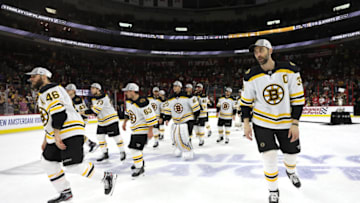 RALEIGH, NORTH CAROLINA - MAY 16: David Krejci #46 and Zdeno Chara #33 of the Boston Bruins celebrate after defeating the Carolina Hurricanes in Game Four to win the Eastern Conference Finals during the 2019 NHL Stanley Cup Playoffs at PNC Arena on May 16, 2019 in Raleigh, North Carolina. (Photo by Bruce Bennett/Getty Images)