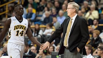 Dec 7, 2015; Iowa City, IA, USA; Iowa Hawkeyes head coach Fran McCaffery congratulates guard Peter Jok (14) during the second half against the Western Illinois Leathernecks at Carver-Hawkeye Arena. Iowa won 90-56. Mandatory Credit: Jeffrey Becker-USA TODAY Sports