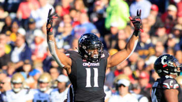 CINCINNATI, OH - NOVEMBER 03: Bryan Wright #11 of the Cincinnati Bearcats celebrates after a sack against the Navy Midshipmen in the second quarter at Nippert Stadium on November 3, 2018 in Cincinnati, Ohio. (Photo by Justin Casterline/Getty Images)