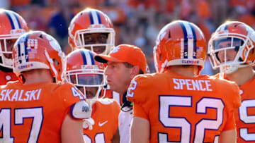 CLEMSON, SC - SEPTEMBER 23: Head coach Dabo Swinney of the Clemson Tigers talks with his players during a pause in their game against the Boston College Eagles at Memorial Stadium on September 23, 2017 in Clemson, South Carolina. (Photo by Todd Bennett/Getty Images)