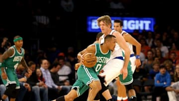Oct 15, 2016; New York, NY, USA; New York Knicks guard Ron Baker (31) defends against Boston Celtics guard Avery Bradley (0) as he plays the ball during the first half at Madison Square Garden. Mandatory Credit: Andy Marlin-USA TODAY Sports