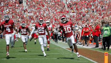 Oklahoma's Pat Fields (10) returns a blocked extra point attempt for two points during a college football game between the University of Oklahoma Sooners (OU) and the Nebraska Cornhuskers at Gaylord Family-Oklahoma Memorial Stadium in Norman, Okla., Saturday, Sept. 18, 2021.Lx19793