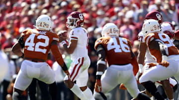 DALLAS, TEXAS - OCTOBER 12: Jalen Hurts #1 of the Oklahoma Sooners throws against the Texas Longhorns in the second quarter during the 2019 AT&T Red River Showdown at Cotton Bowl on October 12, 2019 in Dallas, Texas. (Photo by Ronald Martinez/Getty Images)