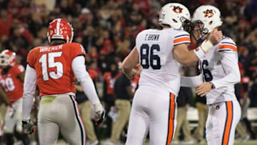 Auburn football tight end Tucker Brown (86) and Auburn kicker Anders Carlson (26) celebrate Carlson's field goal make at Sanford Stadium in Athens, Ga., on Saturday, Nov. 10, 2018. Georgia leads Auburn 20-10 at halftime.Jc Auburnga 30