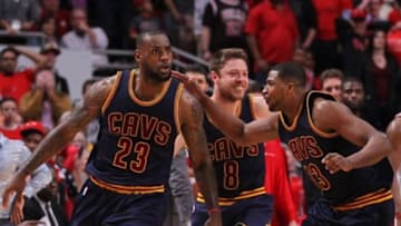 May 10, 2015; Chicago, IL, USA; The Cavaliers Cavaliers forward LeBron James (23) celebrates with teammates after scoring the game winning basket in the second half of game four of the second round of the NBA Playoffs against the Chicago Bulls at the United Center. The Cavaliers won 86-84. Mandatory Credit: Dennis Wierzbicki-USA TODAY Sports